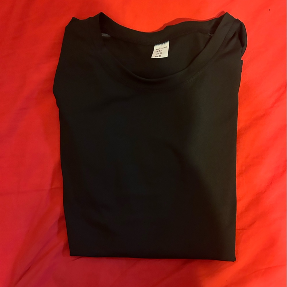 Amazon Basic long sleeve black and grey athletic top size medium